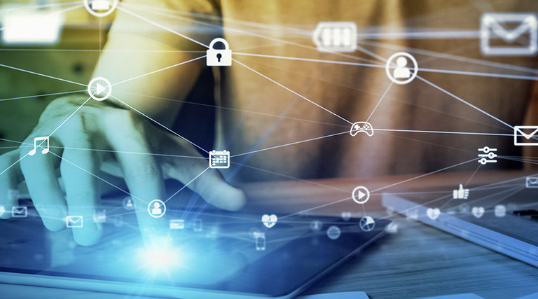 Person working on multiple devices